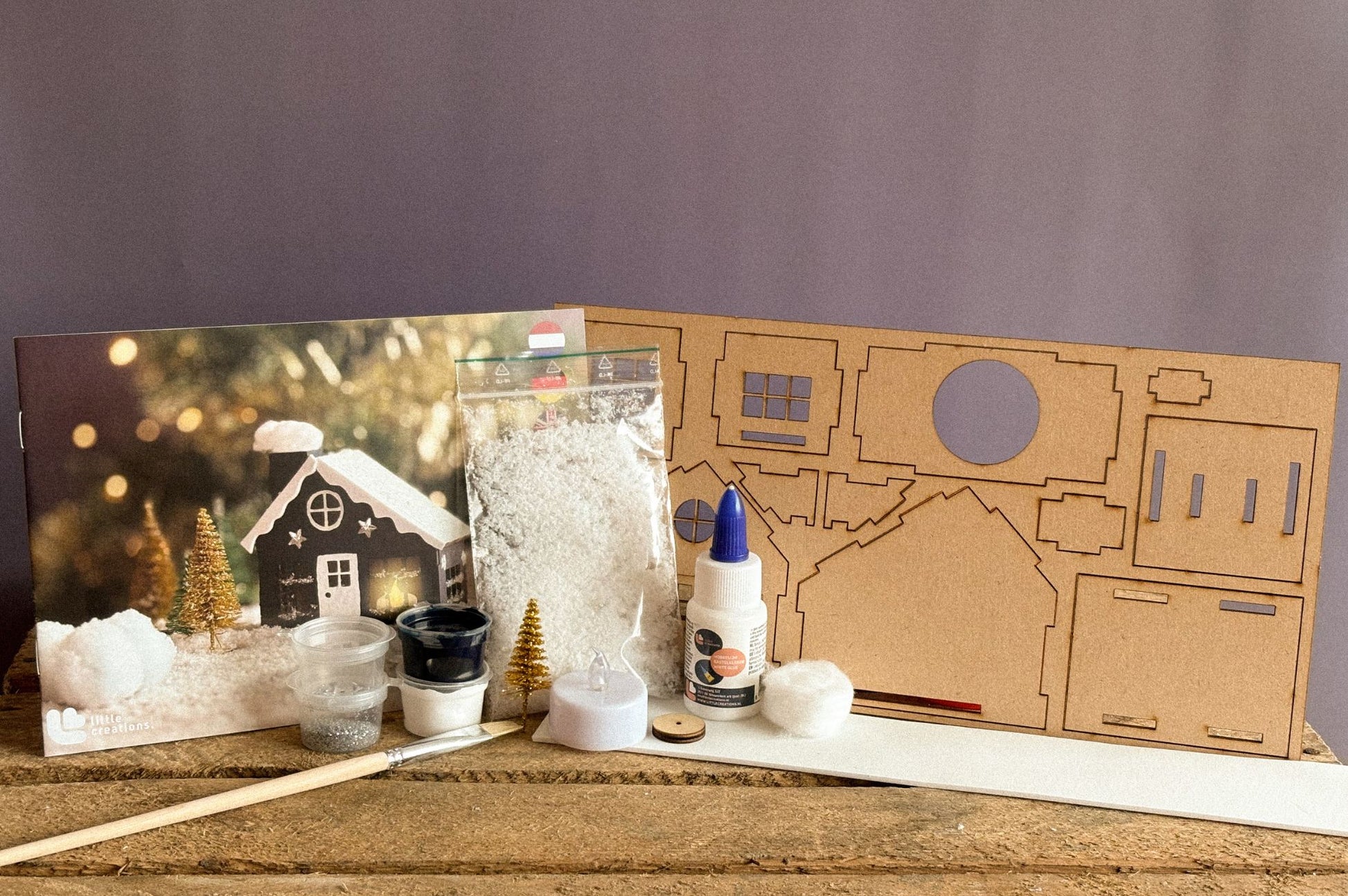 Foto inhalt bastelset holz weihnachtshaus blau